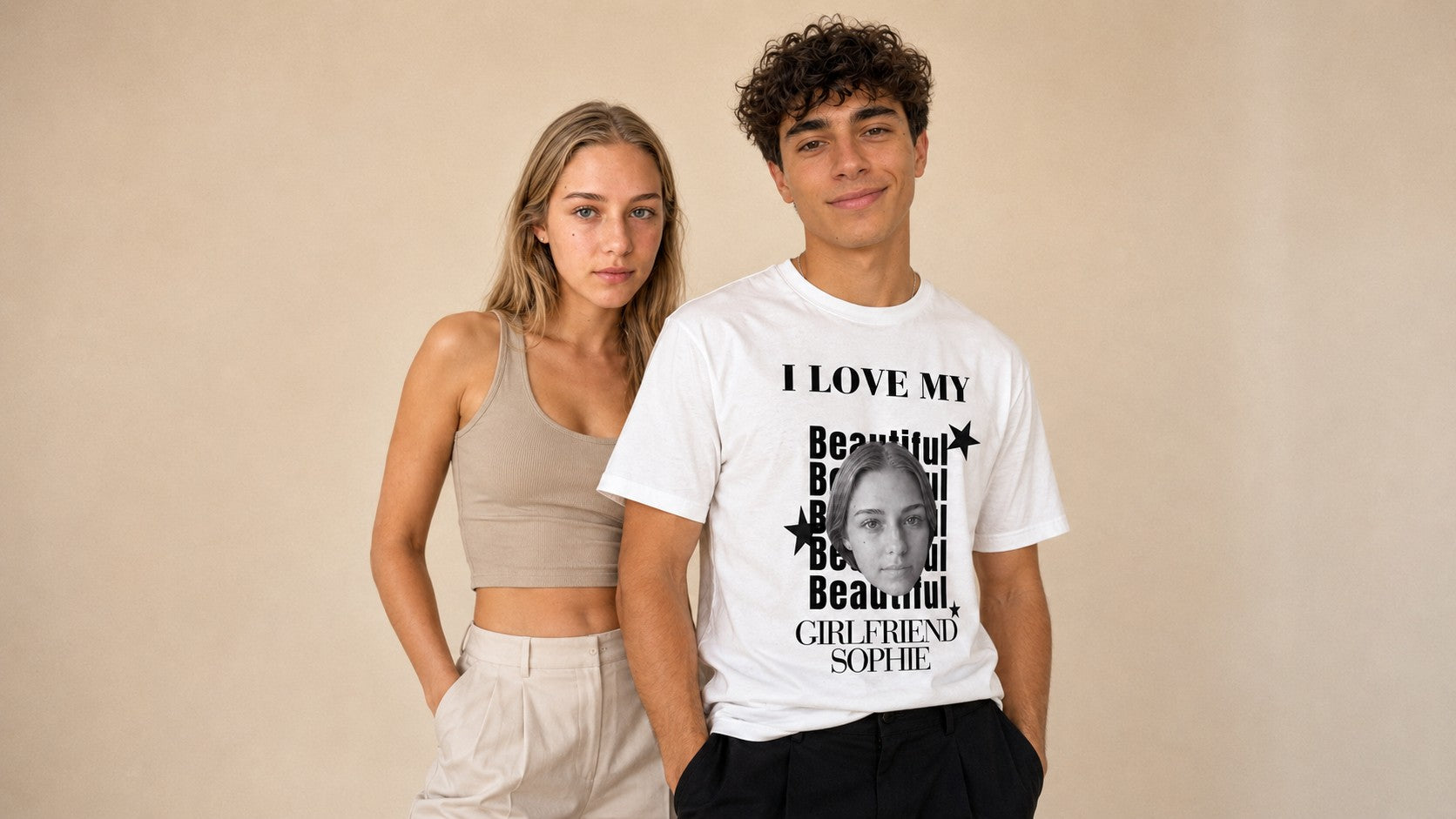 A couple standing together; the man wears the white eragoya t-shirt printed with I LOVE MY, five repeats of the word Beautiful, a cut-out portrait and GIRLFRIEND above the name Sophie.